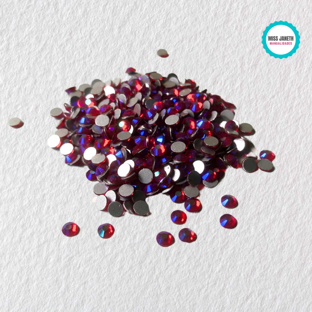 Pedrería cristal tornasol fucsia